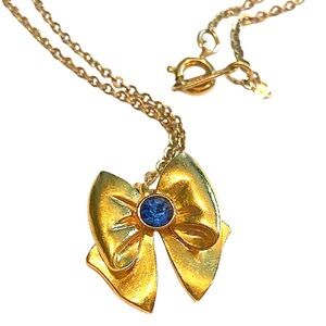 AVON Vintage Bow Necklace Gold Blue Rhinestone